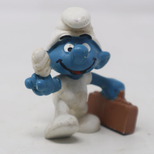 Vintage Schleich Peyo The Smurfs Smurf Holding First Aid Kit Case With Bandaged Finger 2" PVC Figure Figurine West Germany Retro